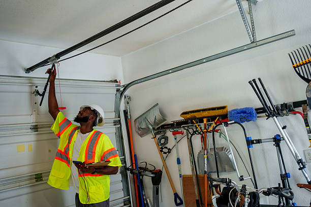 Professional Garage Door Panel Replacement technician working in Arlington, NY